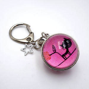 Reversible keychain Peter the cat and the sparkling tree